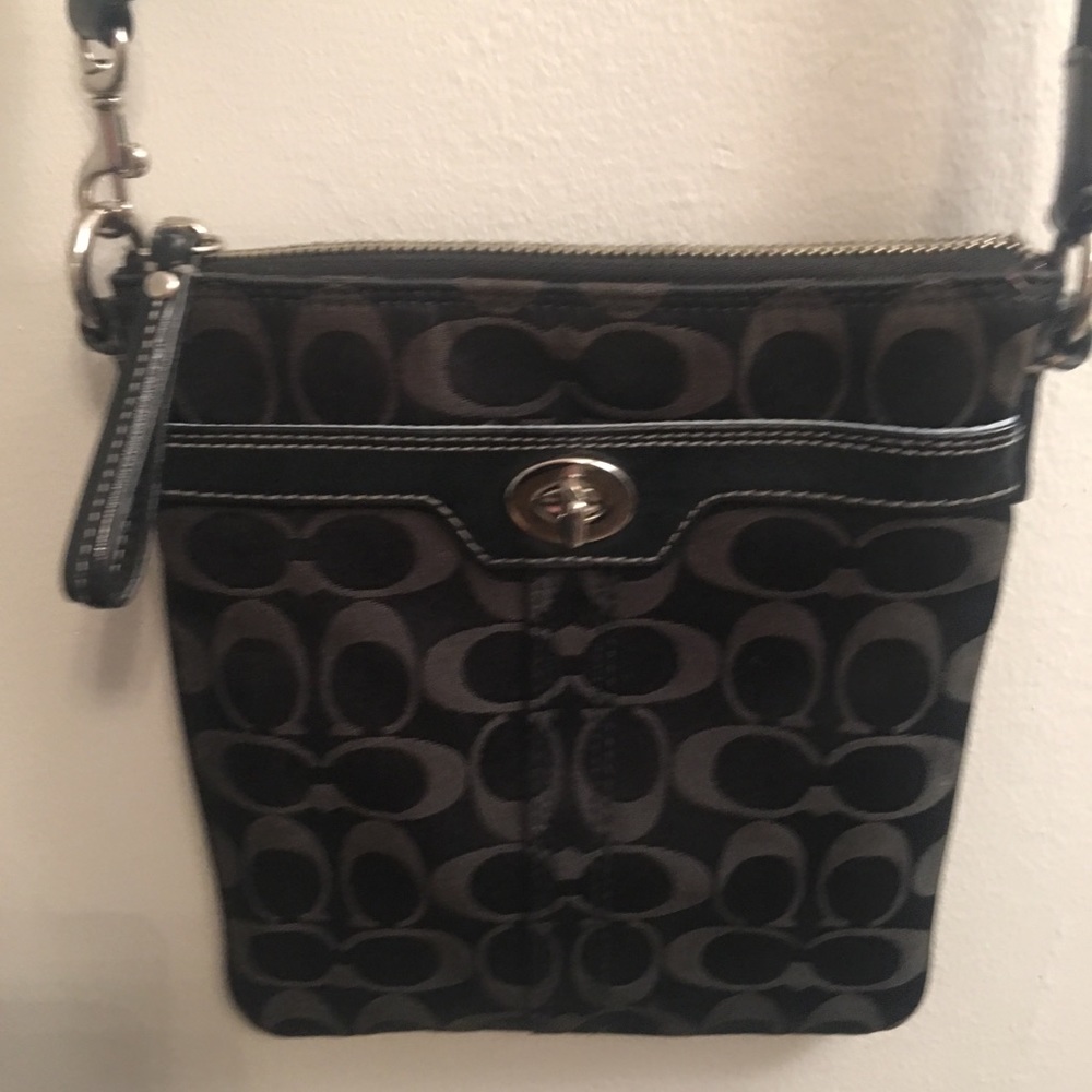 Cross body coach purse.
